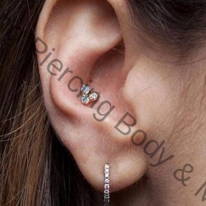 conch piercing and ear piercing done at tattoo mania & body piercing training institute at thane