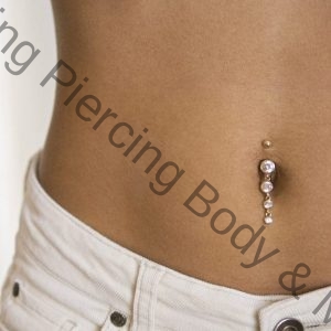 navel piercing and belly piercing done at tattoo mania & body piercing training institute at thane