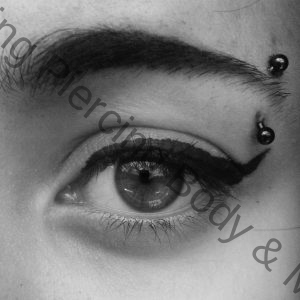 eyebrow piercing done at tattoo mania & body piercing training institute at thane